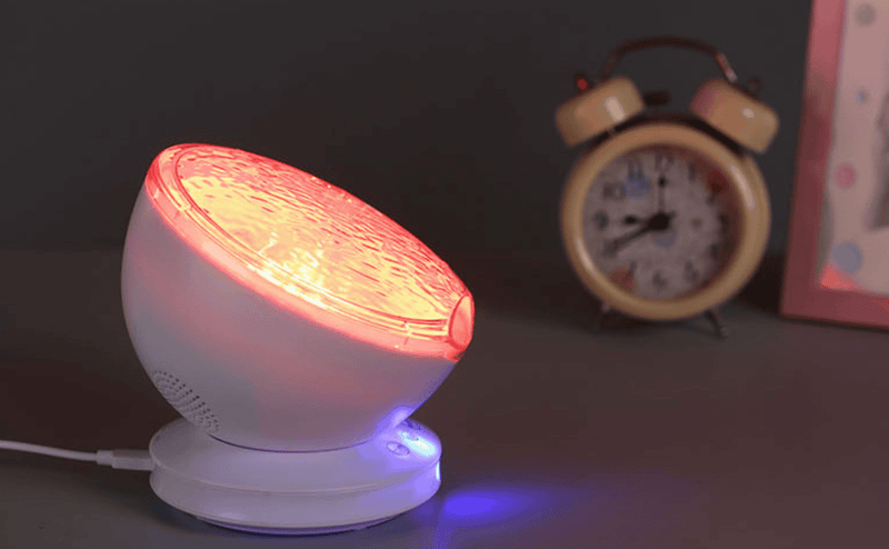 AquaGlow Harmony: Oceanic LED Projector & Sound System