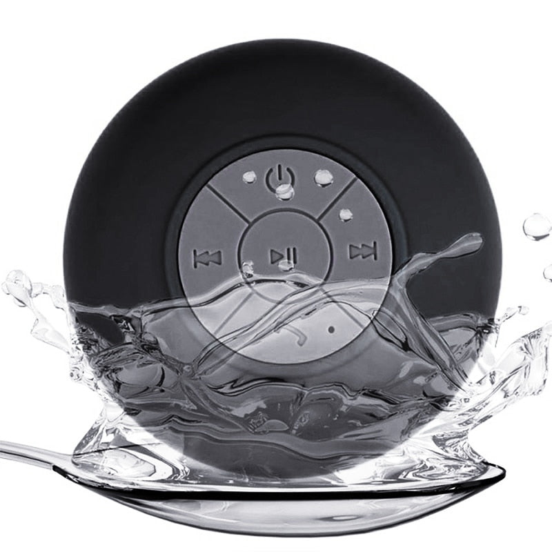 Portable waterproof Bluetooth speaker with suction cup for Bathrooms and Kitchens.