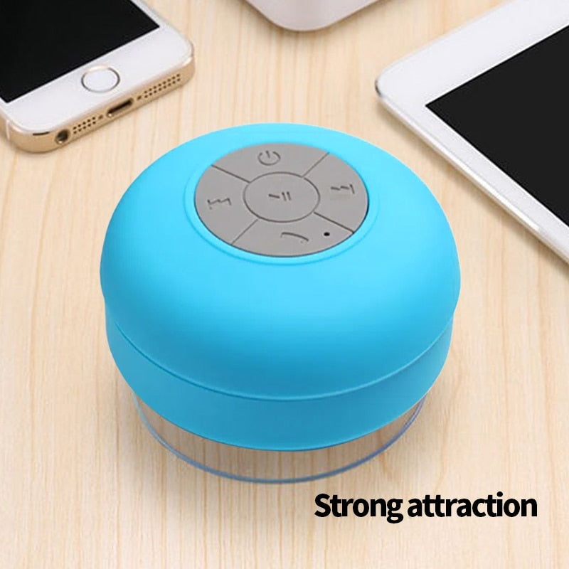 Portable waterproof Bluetooth speaker with suction cup for Bathrooms and Kitchens.